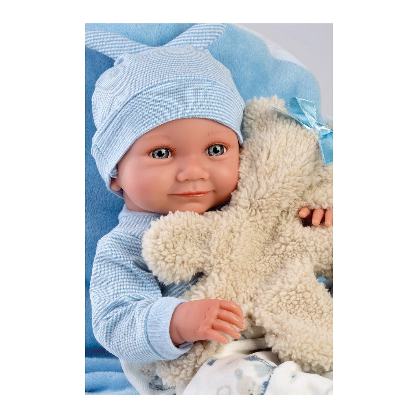 PUPPE NICO MIT BLAUEM KISSEN, 40 CM