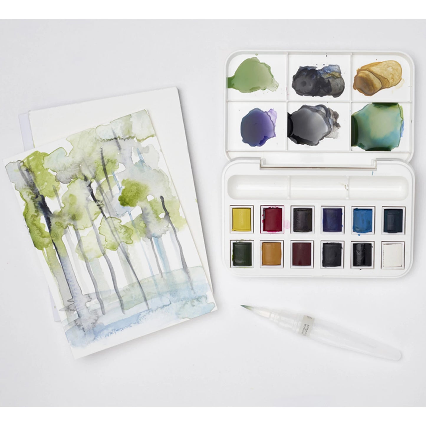 WINSOR&NEWTON - SET MIT 12 HALBEN NÄPFCHEN FÜR W&N COTMAN AQUARELLFARBEN. -