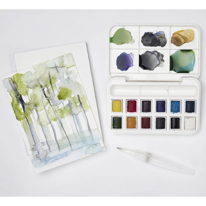 WINSOR&NEWTON - SET MIT 12 HALBEN NÄPFCHEN FÜR W&N COTMAN AQUARELLFARBEN. -